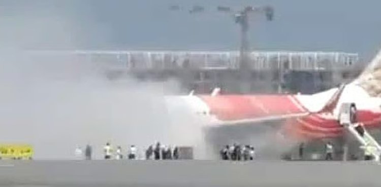 Air India flight AI 315 catches fire after landing in Delhi Air India flight AI 315 catches fire after landing in Delhi