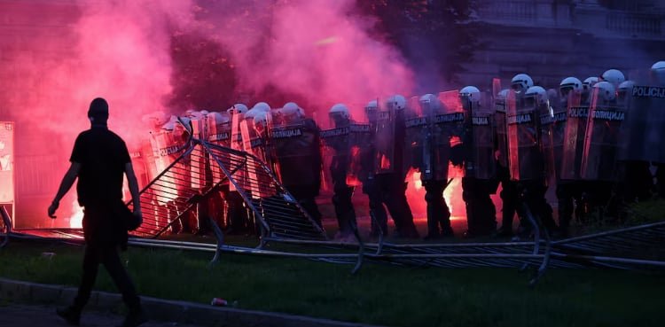 Police and protesters clash in Serbia as crowds demand president’s exit