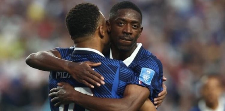 France ease past Iraq in harsh weather